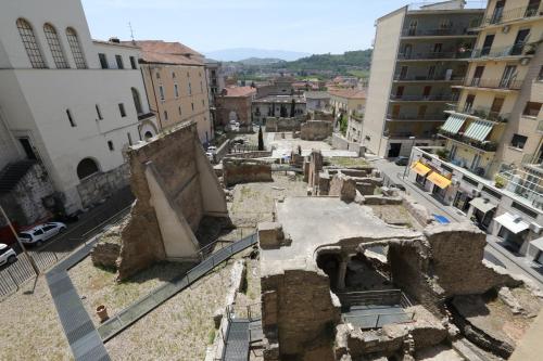 an aerial view of a city with ruins at B&B Dimora del Duomo in Benevento