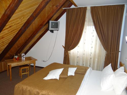 Postel nebo postele na pokoji v ubytování Belvedere