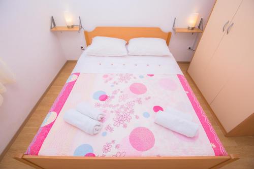 Postel nebo postele na pokoji v ubytování Apartment Rita