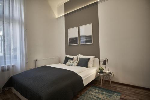 Posteľ alebo postele v izbe v ubytovaní SODA19 Apartment - Budapest