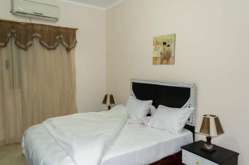 Voodi või voodid majutusasutuse Charbel apartments toas