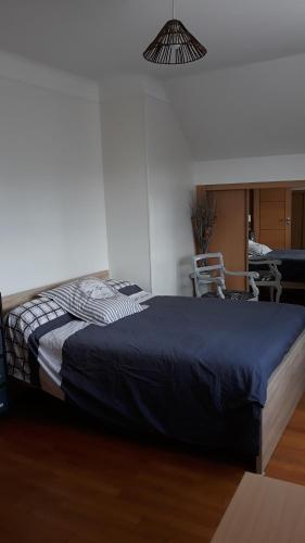Ένα ή περισσότερα κρεβάτια σε δωμάτιο στο Chambre Coquette