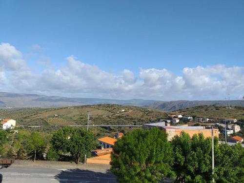 a view of a city with mountains in the background at AP TORRE in Torre de Moncorvo