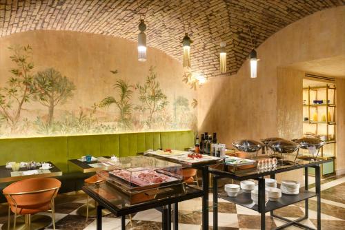 Un lugar para sentarse en Leon's Place Hotel In Rome
