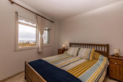 Llit o llits en una habitació de Seaside Charco