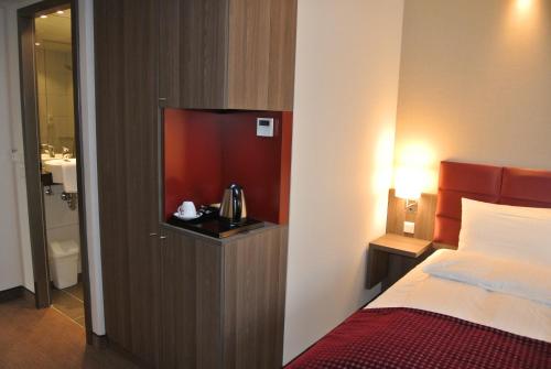 Postel nebo postele na pokoji v ubytování Hotel zur Krone