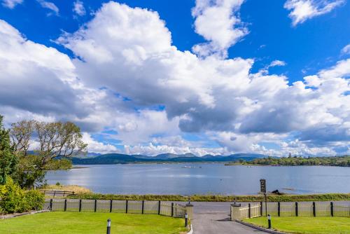 a view of a lake under a cloudy sky at Harbour View in Kenmare