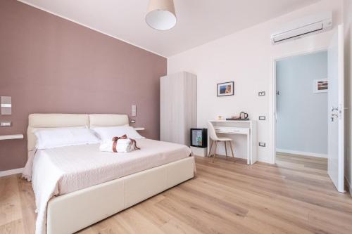 Ένα ή περισσότερα κρεβάτια σε δωμάτιο στο B&B Terza Luna