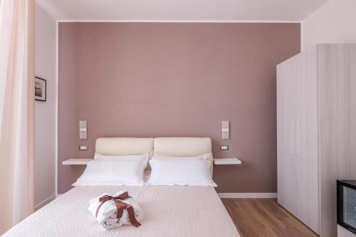 Ένα ή περισσότερα κρεβάτια σε δωμάτιο στο B&B Terza Luna