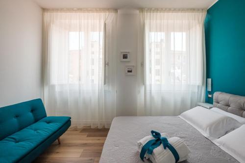 Ένα ή περισσότερα κρεβάτια σε δωμάτιο στο B&B Terza Luna