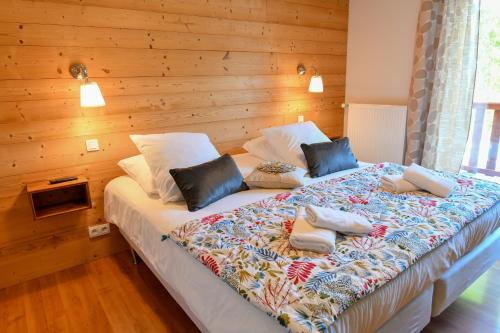 Tempat tidur dalam kamar di L'Escale en Ubaye