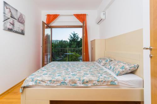 Postel nebo postele na pokoji v ubytování Perla di boka