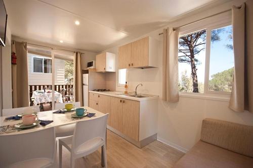 Cucina o angolo cottura di Acquaviva Village Camping
