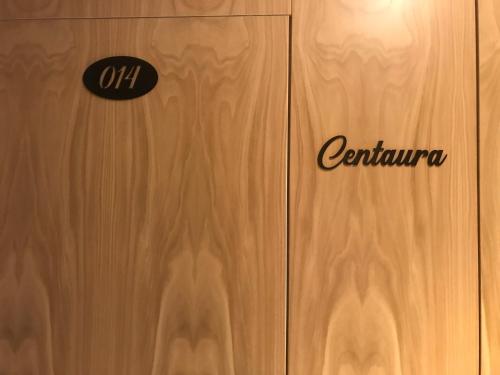 a door with the word quarantine written on it at A Casa da Botica in Samos