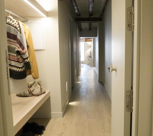 a hallway with a long hallway at El Oasis de la Estafeta in Pamplona