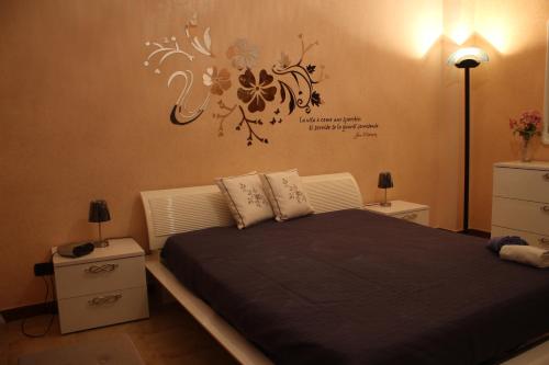 Ένα ή περισσότερα κρεβάτια σε δωμάτιο στο Villa Kronos