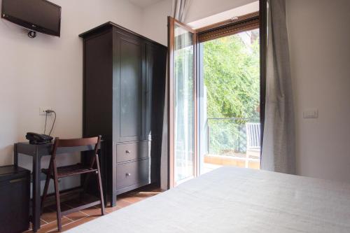 Una cama o camas en una habitación de B&B Maria Rosaria