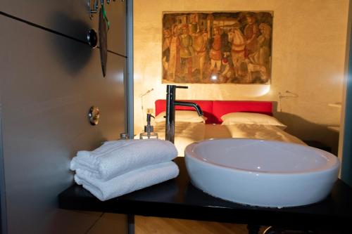Flora Inn, Flora I - Nel cuore di Bergamo Altaにあるベッド