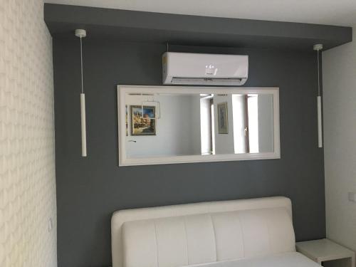Телевизор и/или развлекательный центр в Apartamenty AP 8