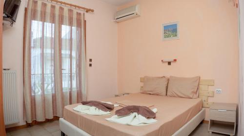 Katil atau katil-katil dalam bilik di Hotel Karagiannis