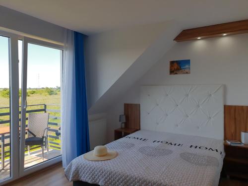 Postel nebo postele na pokoji v ubytování Holiday Amber -
