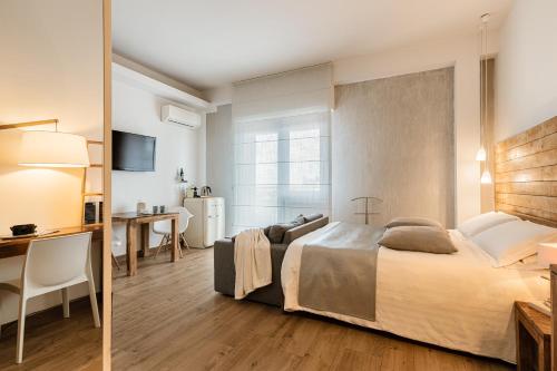 Posteľ alebo postele v izbe v ubytovaní 231 Suite Via Roma