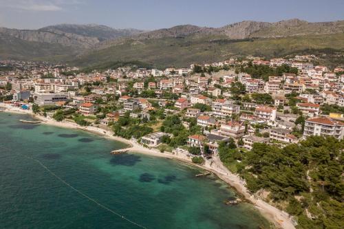 an aerial view of a town on the beach at Pansion Casa in Podstrana