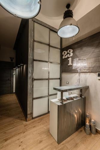 Η κουζίνα ή μικρή κουζίνα στο 231 Suite Via Roma