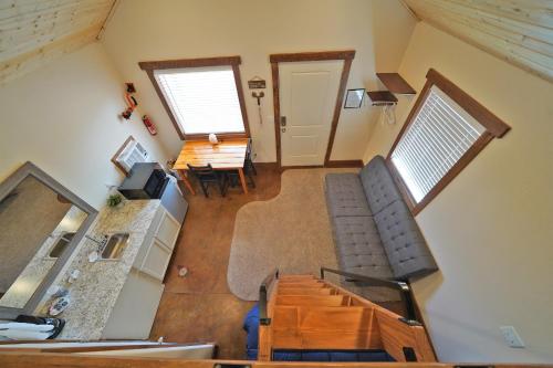 an overhead view of a living room with a table and chairs at Gooseberry Lodges Zion National Park Area in Apple Valley