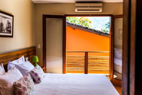 Ένα ή περισσότερα κρεβάτια σε δωμάτιο στο Hotel Fita Azul