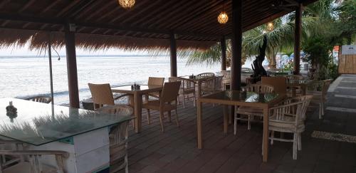 Un restaurante o sitio para comer en Nalini Resort