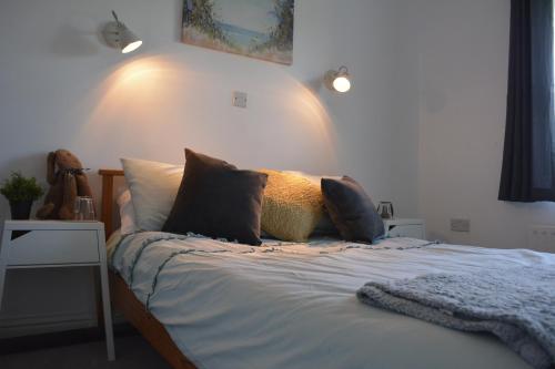 Ein Bett oder Betten in einem Zimmer der Unterkunft Ballyginny Cottage