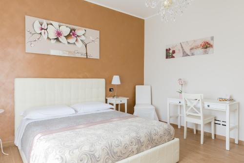 A bed or beds in a room at B&B Le City