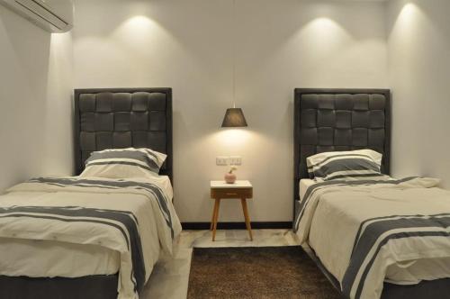 Posteľ alebo postele v izbe v ubytovaní Apartment in Mohandesin (Families Only)