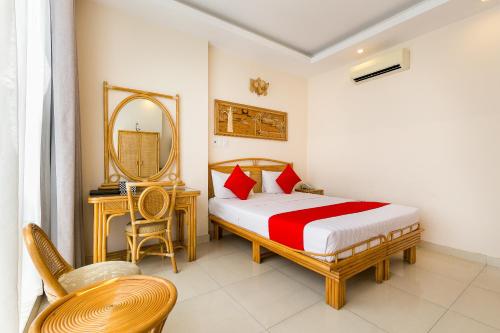 Giường trong phòng chung tại Calmette Hotel 151 - Ben Thanh