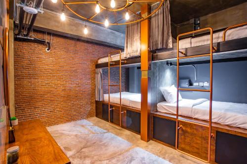 Postel nebo postele na pokoji v ubytování Kaen Hostel
