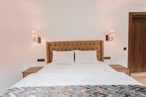 Katil atau katil-katil dalam bilik di İSKALİTA Otel