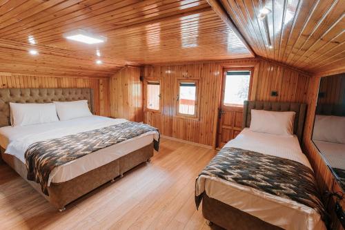 Katil atau katil-katil dalam bilik di İSKALİTA Otel