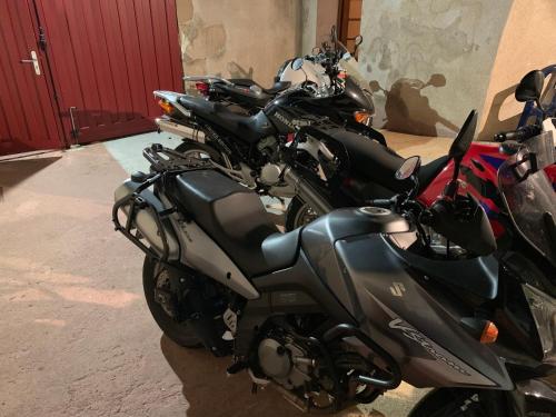 a row of motorcycles parked next to a building at Pub vauban terreaux in Avallon