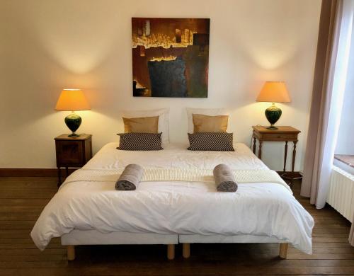 En eller flere senge i et værelse på Gîte 90m2, grande terrasse, 3 chambres Mondelange