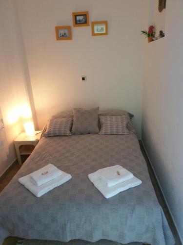 Krevet ili kreveti u jedinici u okviru objekta Rooms and Apartments V&M