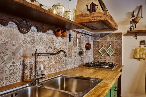 A kitchen or kitchenette at La casa del Balivo