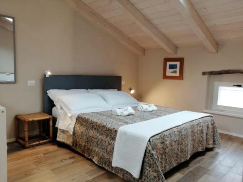 Postel nebo postele na pokoji v ubytování Casa di Vania