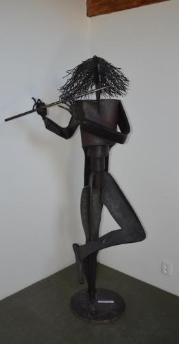 a statue of a woman holding an umbrella at Penzion Bejby Turnov in Turnov