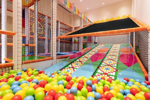 a large pool filled with lots of balls at Titanic Mardan Palace in Lara