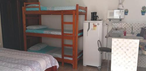 Lova arba lovos apgyvendinimo įstaigoje Hospedagem Lagoinha