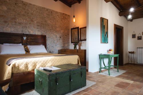 A bed or beds in a room at Aurora Medieval House