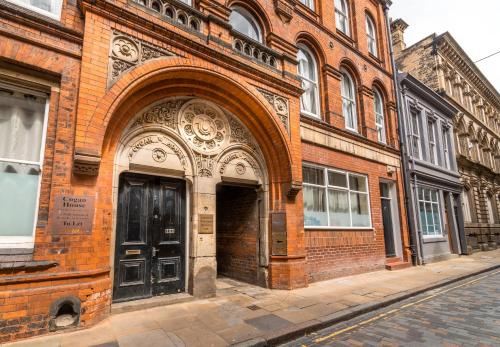 a brick building with an archway on a street at 1 Bed Old Town City Studio near Theatre Suit Work or Leisure in Hull