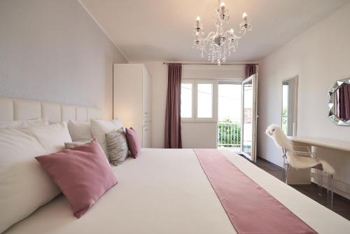 Postel nebo postele na pokoji v ubytování Apartment Epetij 2