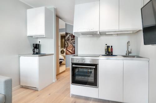 Dapur atau dapur kecil di Barfot Apartments